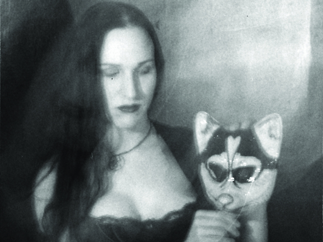 Mirha-Soleil Ross holding a fox mask, from Yapping Out Loud.